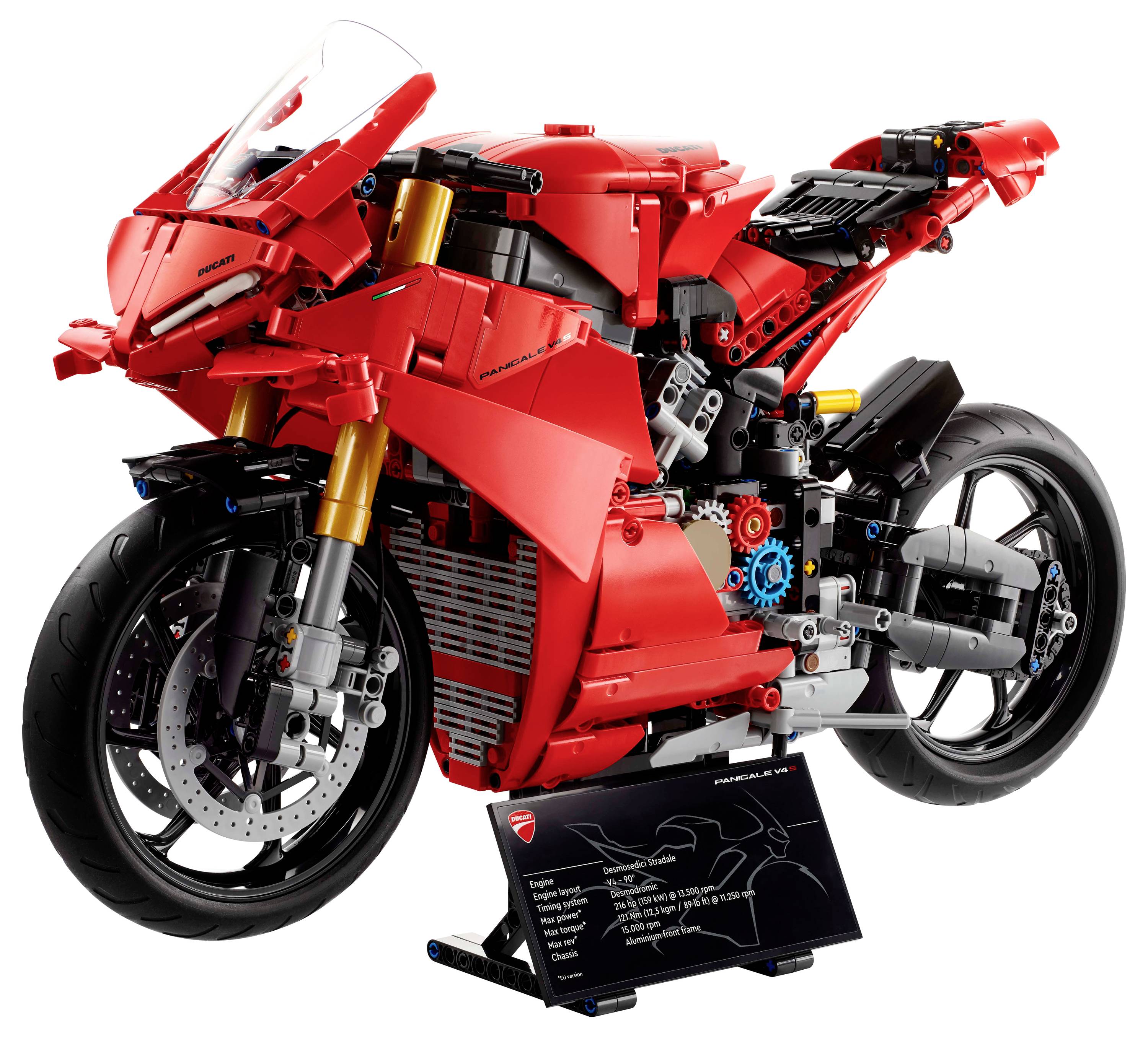 A red Lego motorcycle model on a stand with technical details.