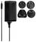 A black power supply with four different, interchangeable adapter plugs for international power sockets.