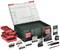 Tool set with a green, transparent case and red closure. Contains various drill bits, bits, measuring tape and accessory parts. Brand name on the lid.