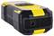 A yellow and black portable electronic device, possibly a handheld scanner or measuring instrument, with a grid on the front.