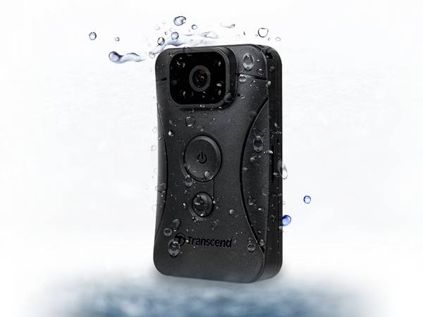 Black, waterproof camera with buttons on the front, surrounded by water splashes, on a white background.