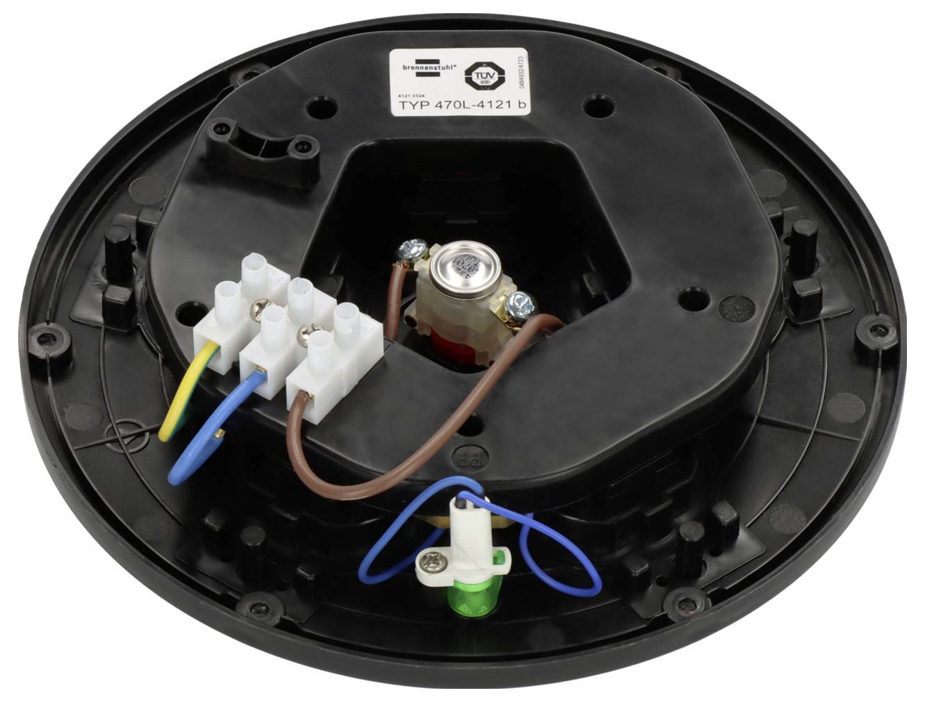 Underside of a round black electrical device with wiring terminals, a central component, and a label reading 'TYP 470L-4121 D'.