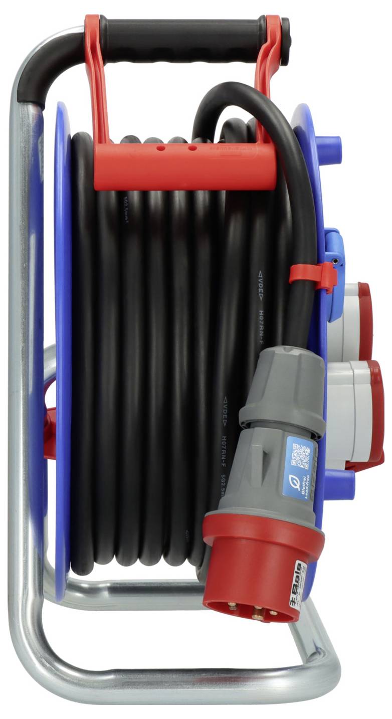 A cable drum trolley with a coiled black cable, red and blue handle. Sockets and a plug are located on the right.