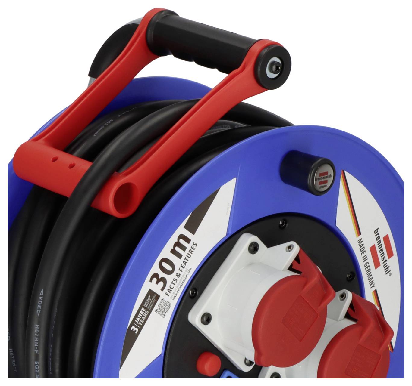 A blue cable reel with a red handle shows three plug sockets. '30 m' and 'IP44 for outdoor use' are visible on the label.