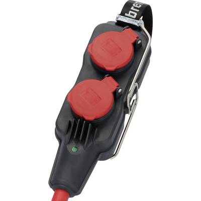 Portable black power strip with two red covered outlets, green indicator light, and hanging strap on a white background.