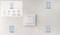 Wall switch with control options: 'Light' on/off, adjust brightness; 'Curtains'; 'Scenes'; 'Garage'.