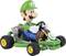 A figure in a green suit is driving a green go-kart.