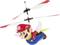 A toy helicopter with a figure of an animated character in a red suit and cap, hands outstretched, ready to fly.