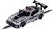 Silver model racing car on a track with 'Safety Car' and 'AMG' markings, fitted with a prominent rear spoiler.