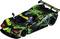 'Toy racing car in black and green with a striking design, featuring prominent "Trackday.de" logos and a driver in the cockpit.'