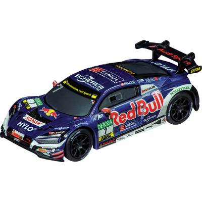 Toy model of a racing car, decorated with numerous brand logos, such as 'Red Bull' and 'Audi Sport'.