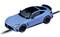 A blue toy racing car at scale on a race track. The car has a sporty design with black accents and tyres.