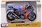 Toy KTM RC 390 motorcycle model in orange and blue, packaged in a Maisto box. Suitable for children aged 3 and above.