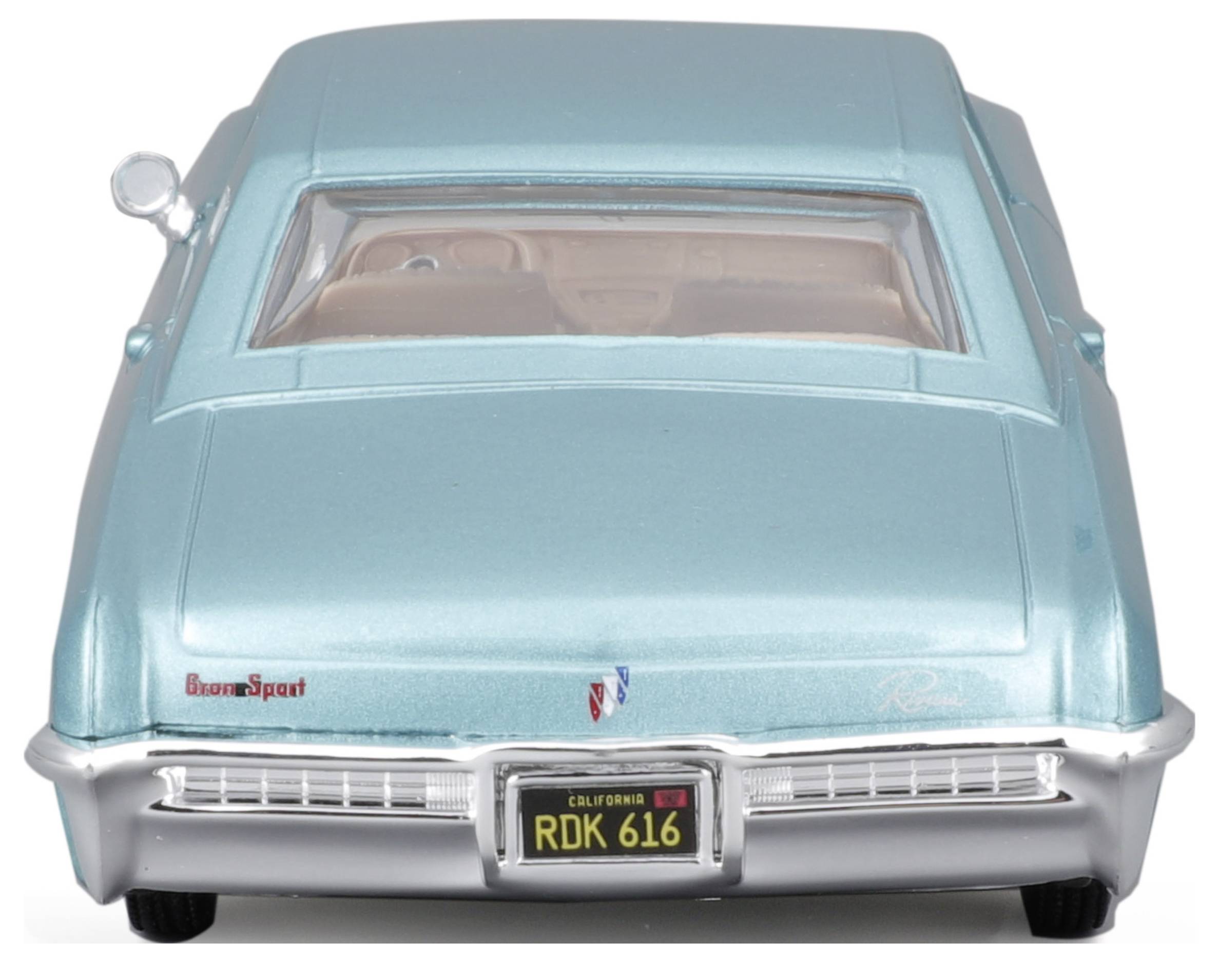 A turquoise toy car from behind with a California number plate 'RDK 616'.