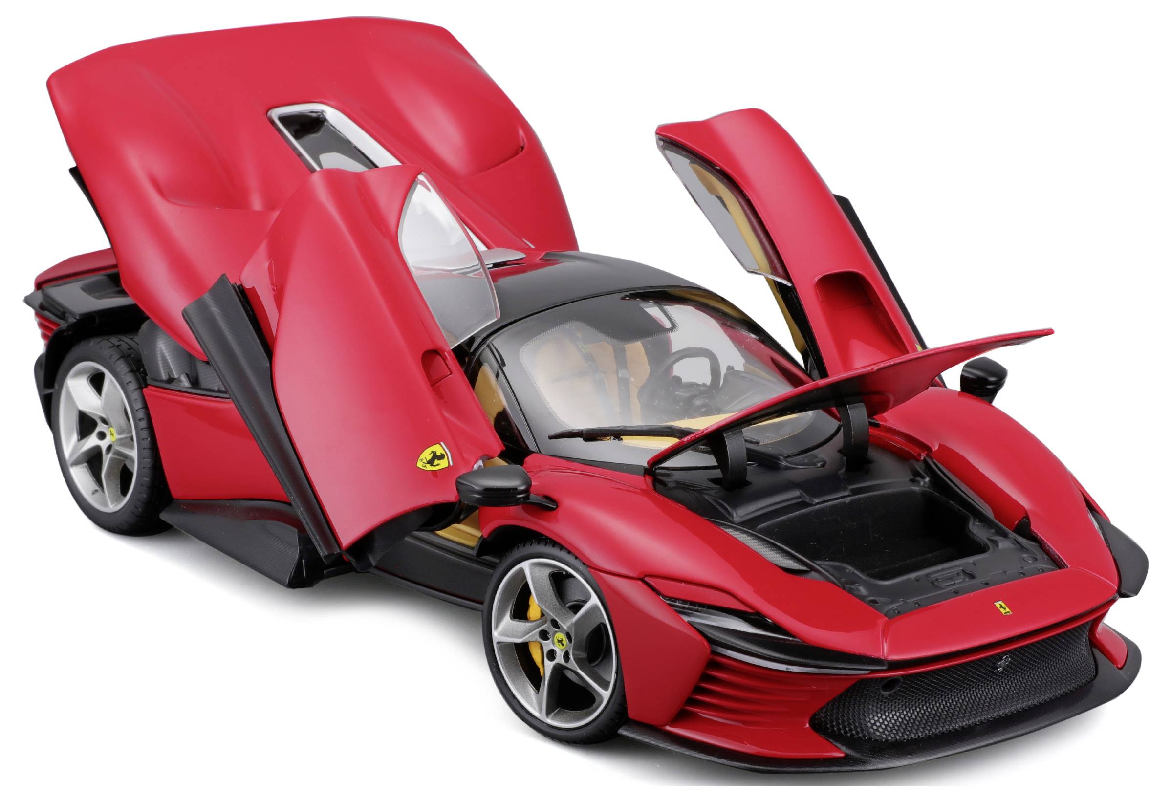 A red model car with open gullwing doors reveals details of the interior and front boot.