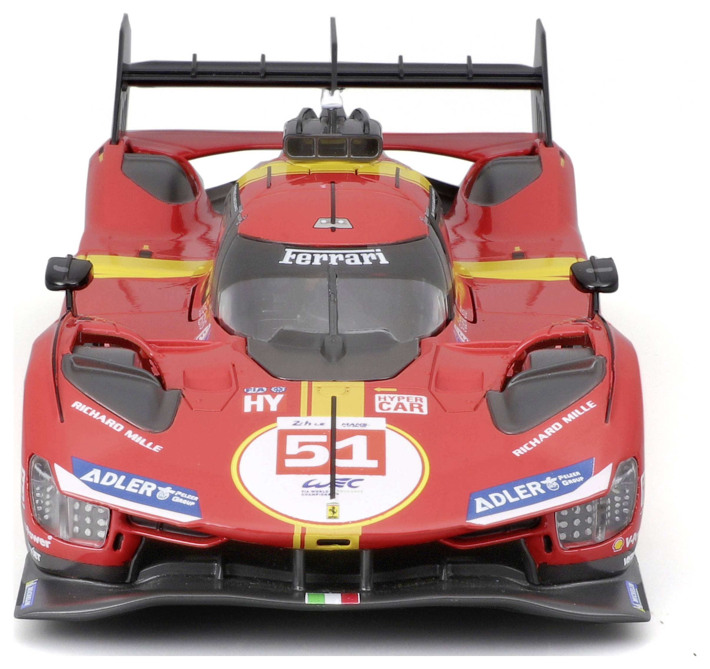 A red Ferrari racing car, Model '51', with advertising decals, photographed from the front. Racing car design with aerodynamic shapes.