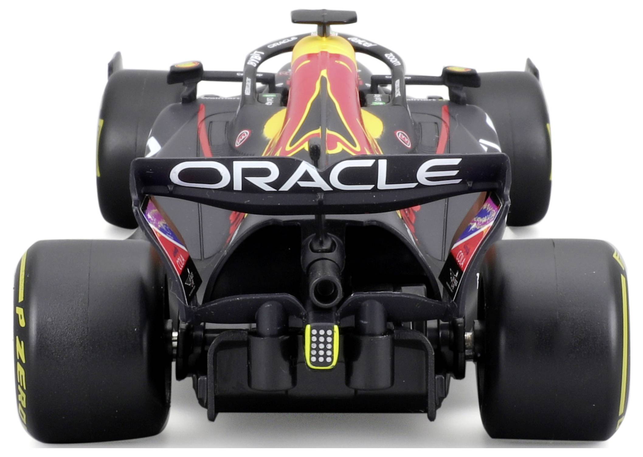 Racing car from behind, black bodywork with colourfully printed design. Dominant 'Oracle' logo on rear wing.