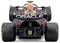 Racing car from behind, black bodywork with colourfully printed design. Dominant 'Oracle' logo on rear wing.