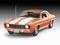 An orange and white classic sports car, probably a Chevrolet, displays a sleek, classic design with two doors.