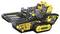 A modular robot vehicle with yellow and grey components on tracked drive, suitable for creative play or model building.