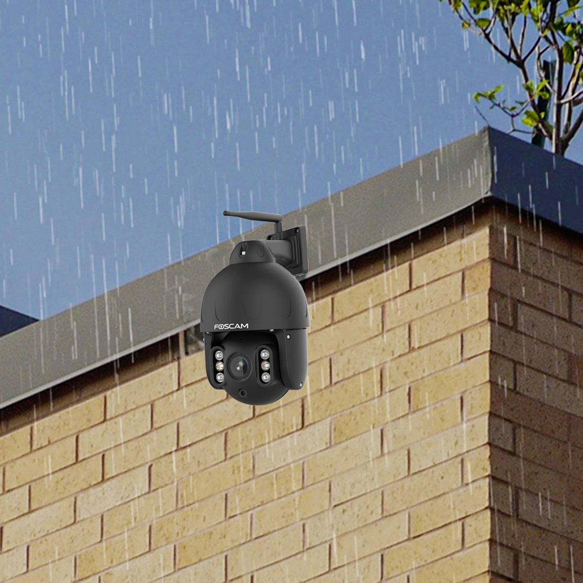 A surveillance camera is mounted on a brick wall beneath a rainy sky. A tree branch is visible in the top right.