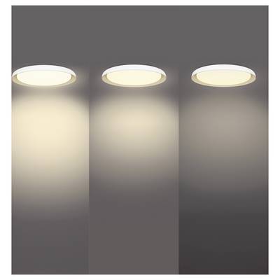 Three ceiling downlights shown side by side, illustrating different brightness levels of the same circular recessed light on a gray wall.