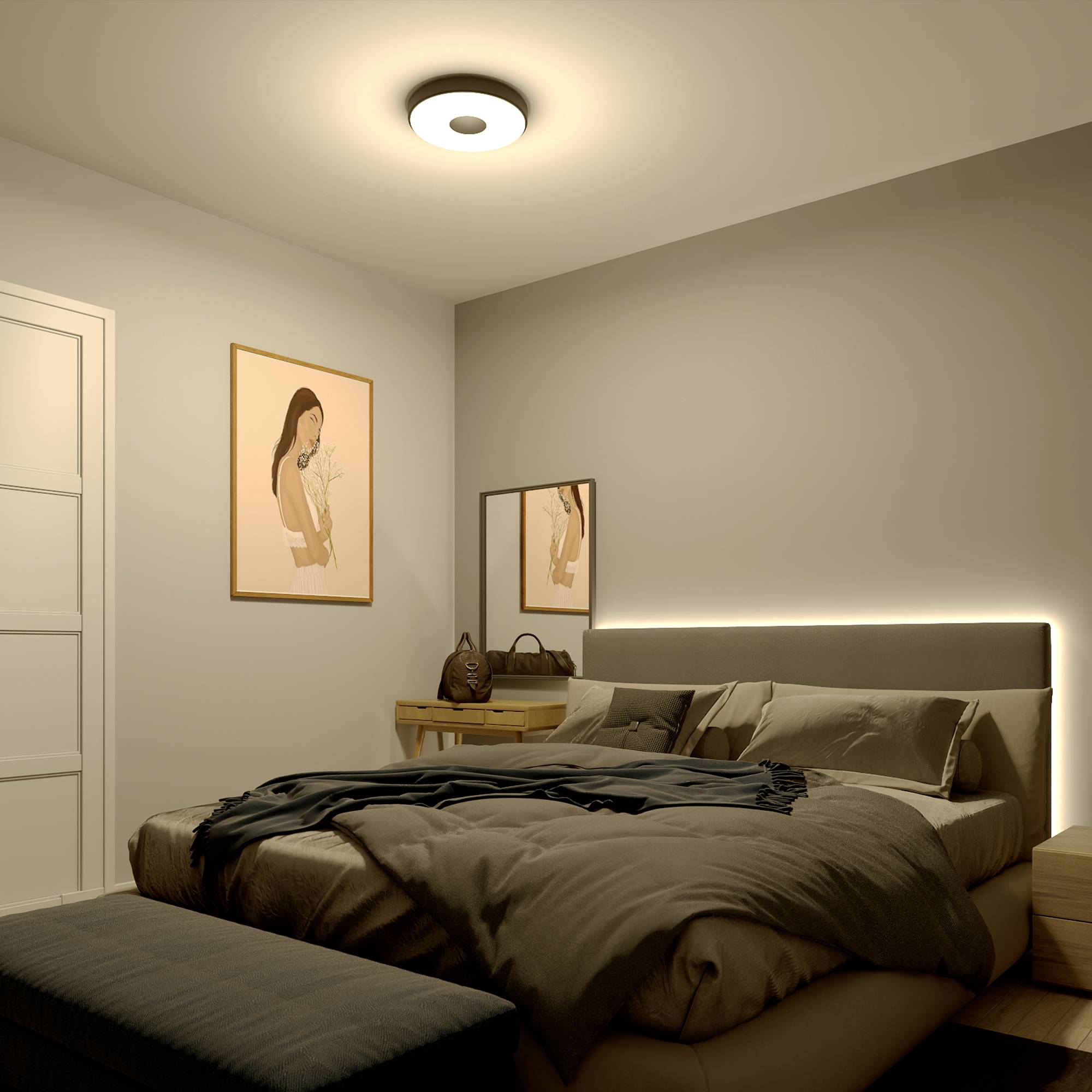 Bedroom with a double bed, dark bedspread, wooden furniture and wall decorations. Soft lighting creates a cosy atmosphere.
