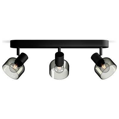 Three black ceiling lights with transparent lampshades, each pointing in a different direction, against a white background.
