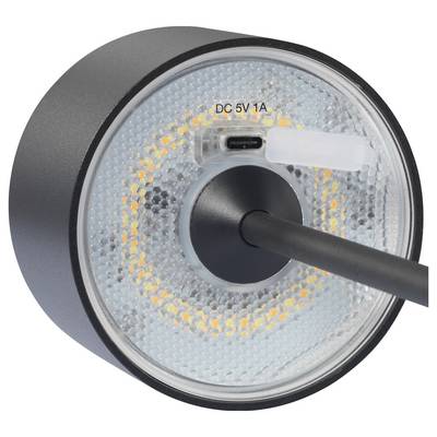Close-up of a round, luminous LED light with a black cable and power connection labelled 'DC 5V 1A' inside.