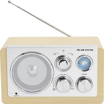A vintage FM/AM radio with a wooden cabinet, large speaker on the left, and three rotary knobs on the right for volume and frequency selection.