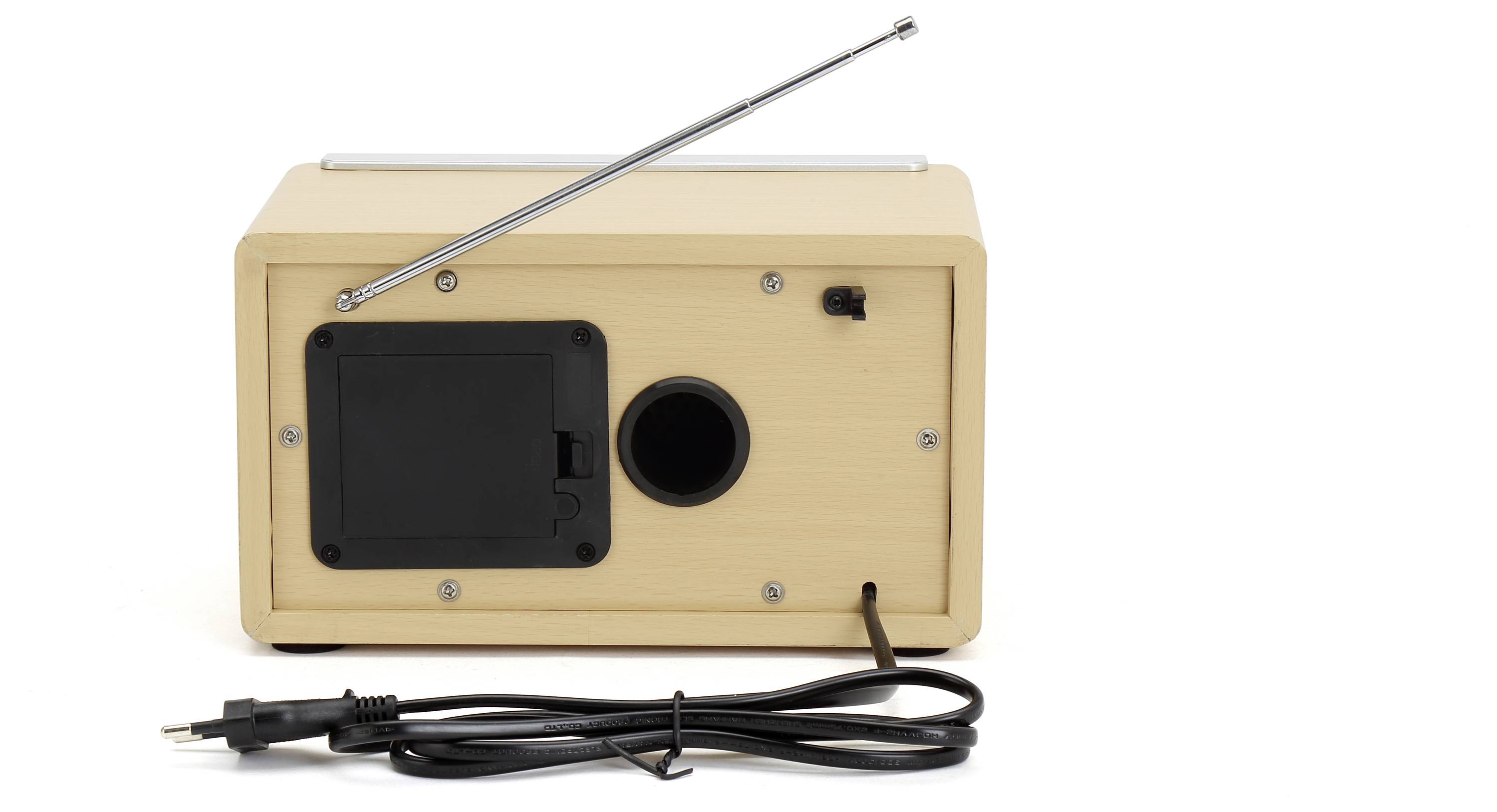 Wooden radio with telescopic aerial, rear view, showing power connection and speaker opening, with power cable in the foreground.