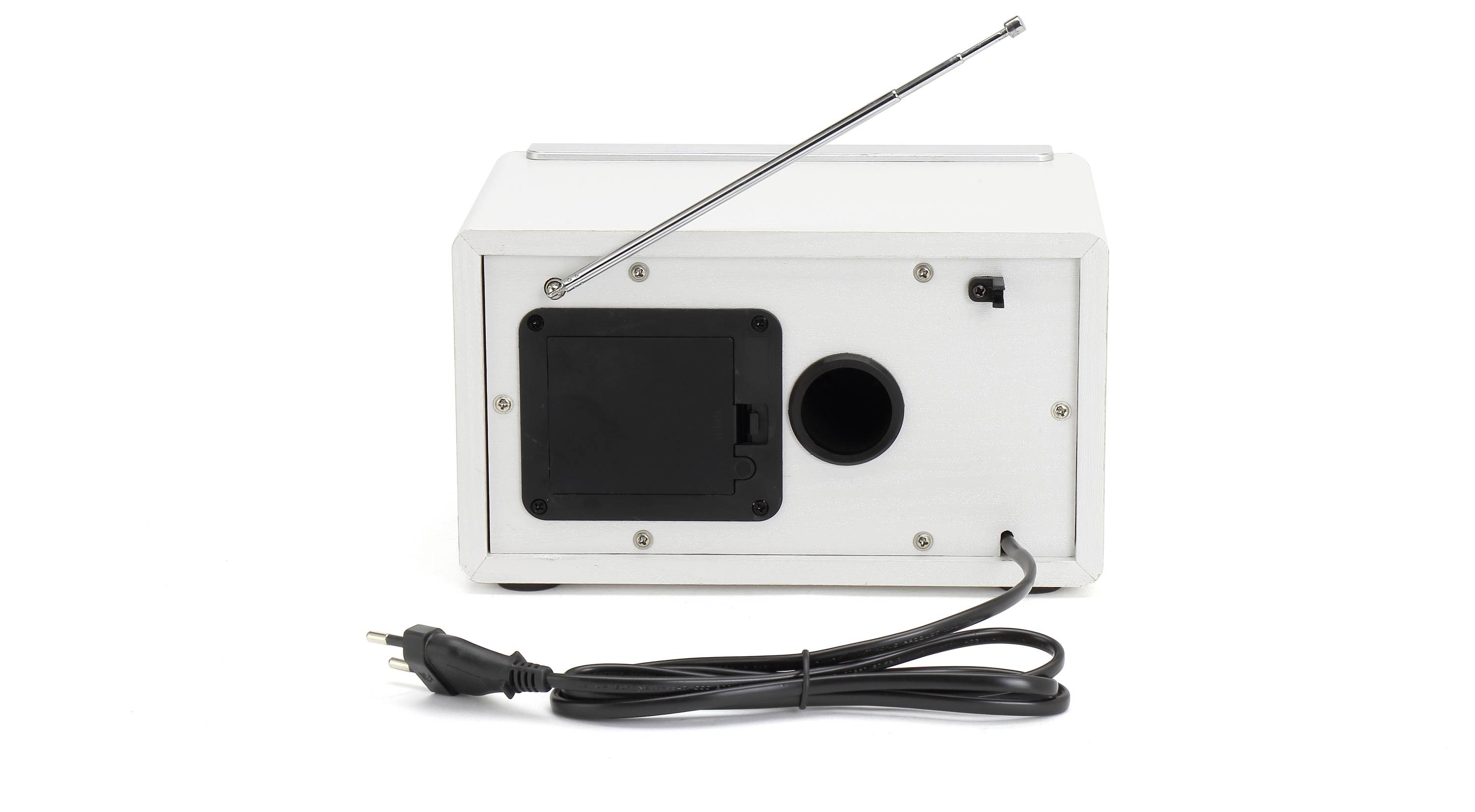 A white radio viewed from behind, featuring an aerial, power connection, cable, and speaker grille.