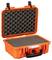 An orange hard-shell suitcase with an open lid reveals foam-padded compartments inside to protect delicate items.