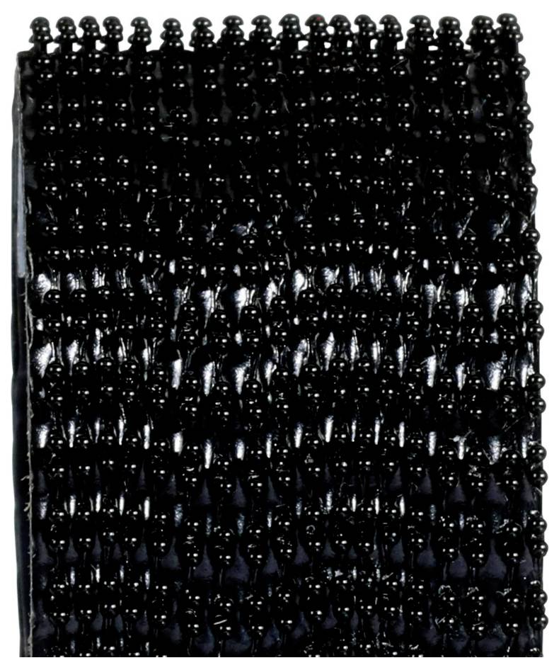 Close-up of a black hook-and-loop fastener with dense hooks.