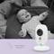 A baby is lying laughing under a blanket. Next to the picture is a round camera with the inscription 'Automatic Night Vision'.