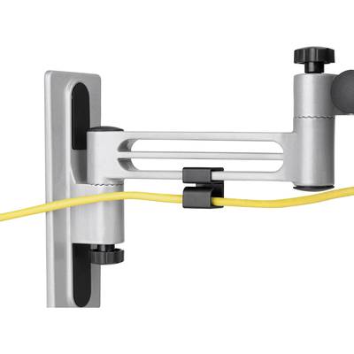 A yellow cable runs through a white cable clip attached to a movable grey wall mount.