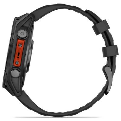 Black wristwatch with a red accent on the side, dark silicone strap and two side buttons, viewed from the side.