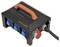 Black, portable power distribution unit with an orange handle, four blue sockets and one red high-power socket.