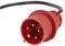 Red high-current plug with multiple golden contacts and a black cable in the background.