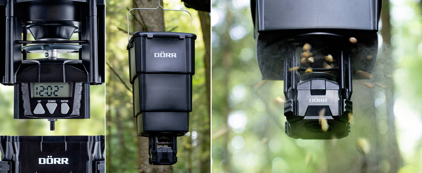 A feed dispenser mounted next to a tree in the forest. On the left, a digital display shows '12:02'. On the right, the dispenser is distributing feed into the air.