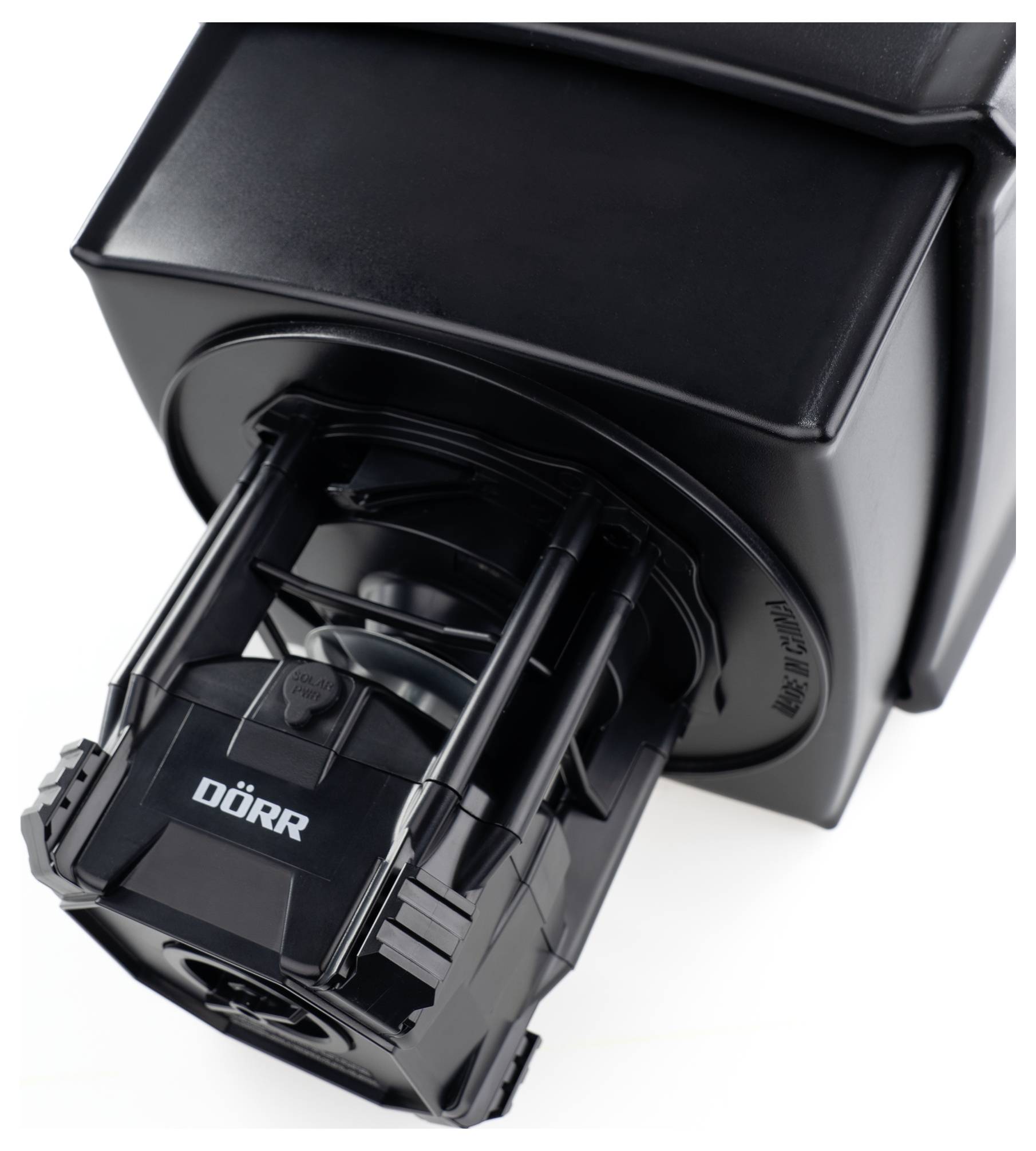 The pictured object is a black Dörr projector, photographed at an angle from above.