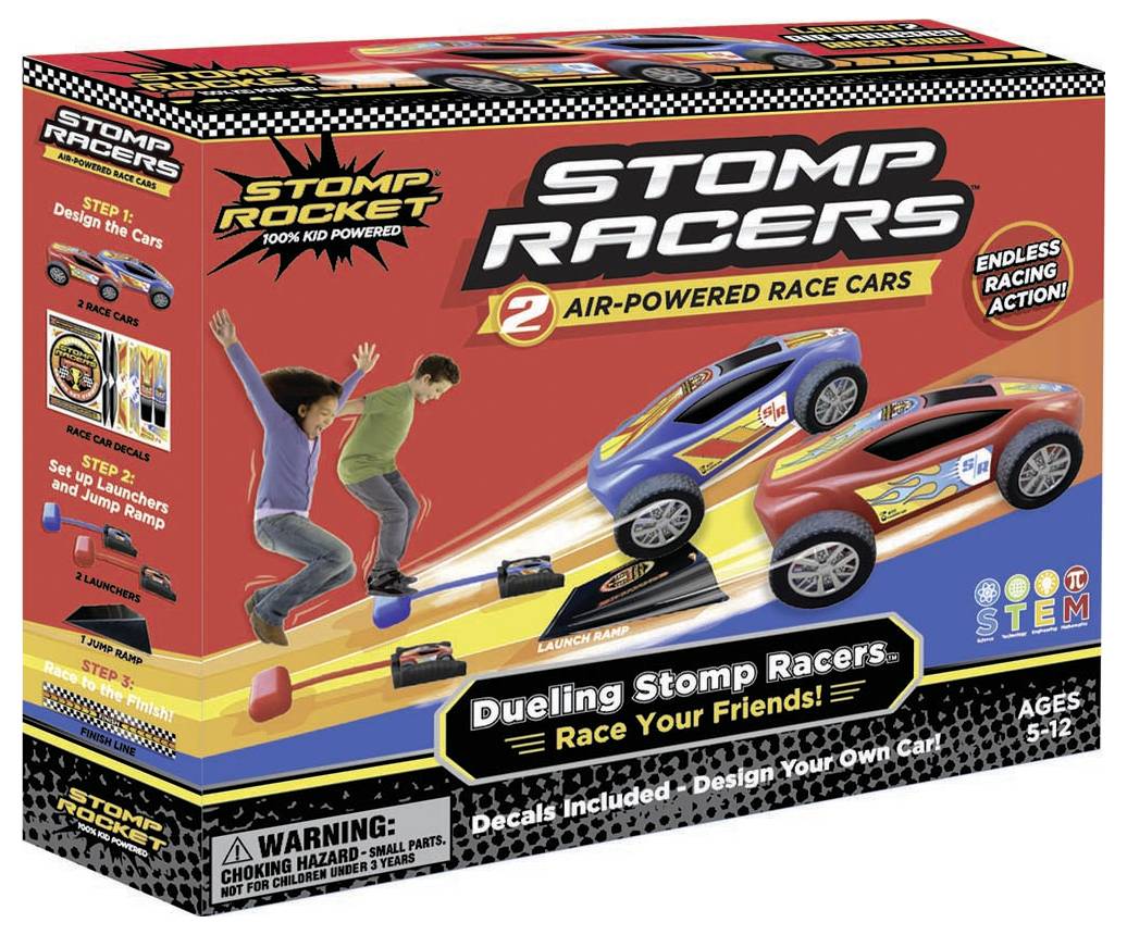 A toy packaging shows two children jumping on a launch ramp to start two model racing cars. Text: 'Duelling Stomp Racers'. For children aged 5 to 12 years.