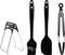Barbecue utensil set comprising a chicken roaster, basting brush, spatula, and tongs, made from black plastic and metal.