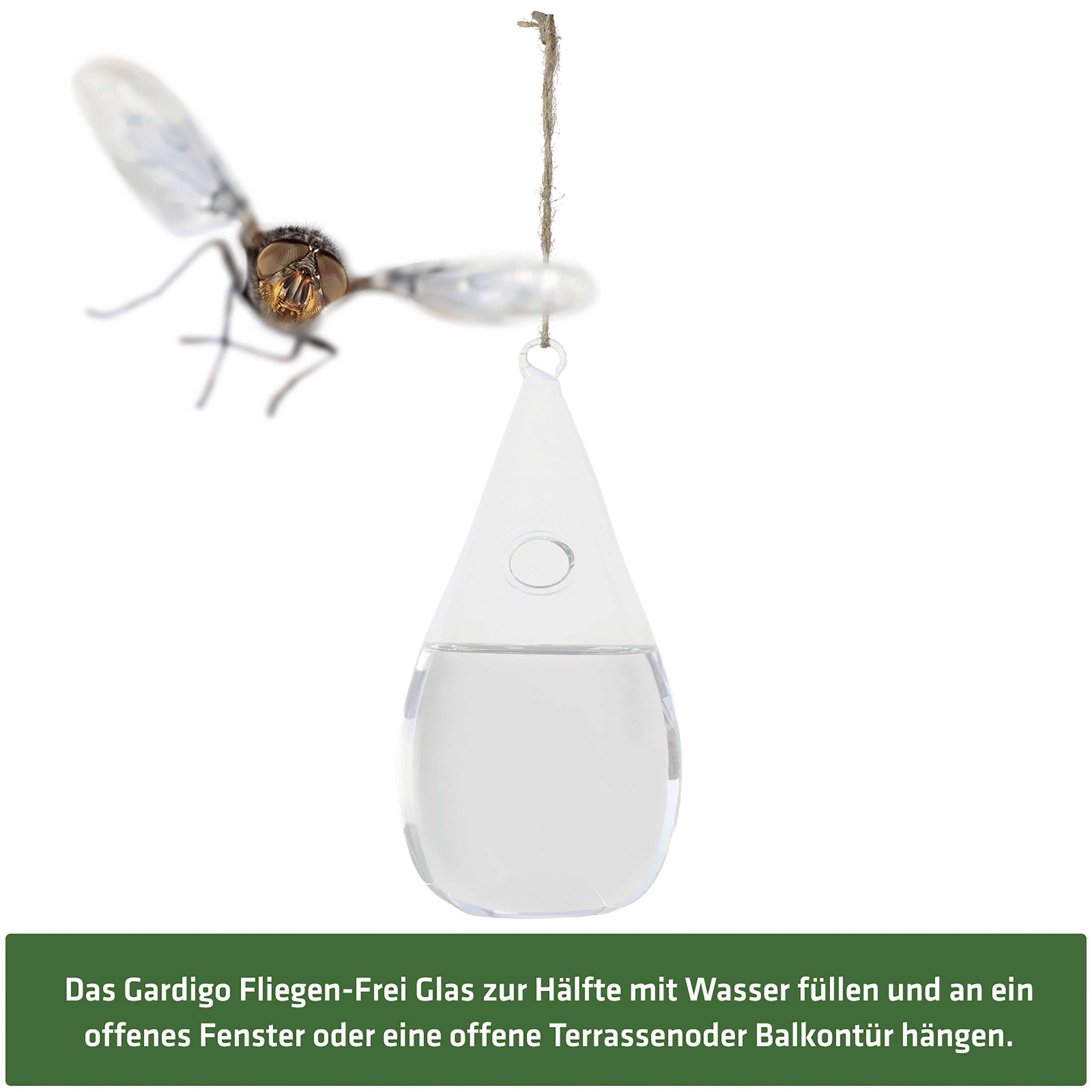A water-filled fly catcher hanging on a string. It is used to keep flies away. The text below describes its application.