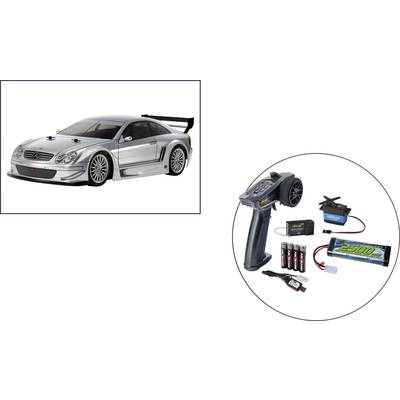 RC Car and Remote Control with Accessories: Batteries, Charger, and Receiver. Silver Racing-Style Model Car.