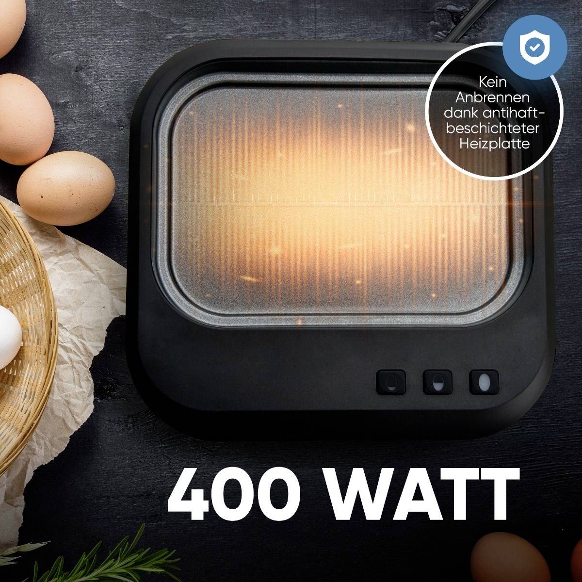 Electrical appliance with an illuminated hotplate and the display '400 WATTS'. The text indicates a non-stick coated hotplate.