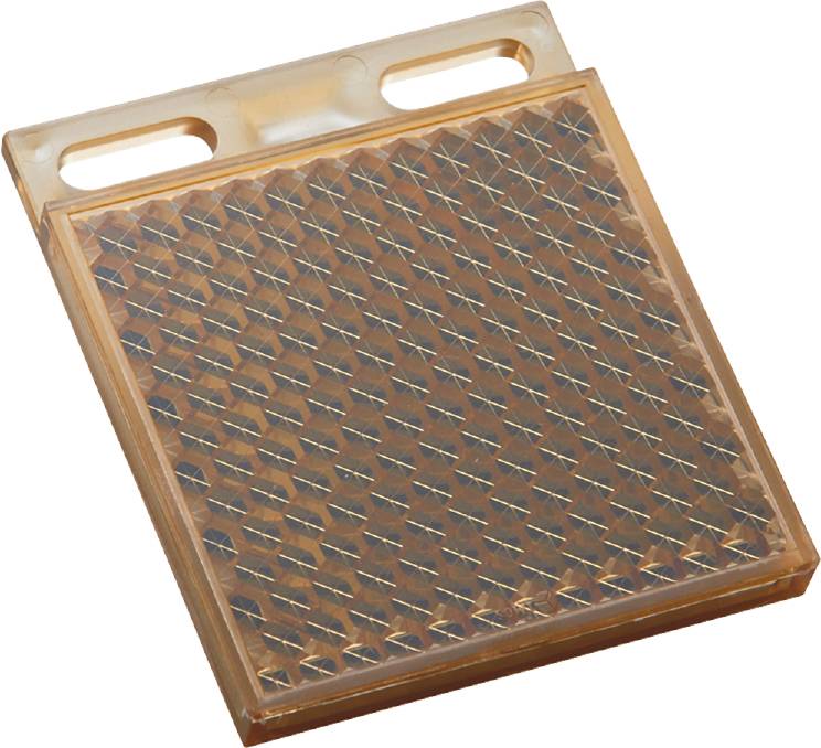 A rectangular, translucent plastic block with handles and a textured surface. Suitable as a safety mat.