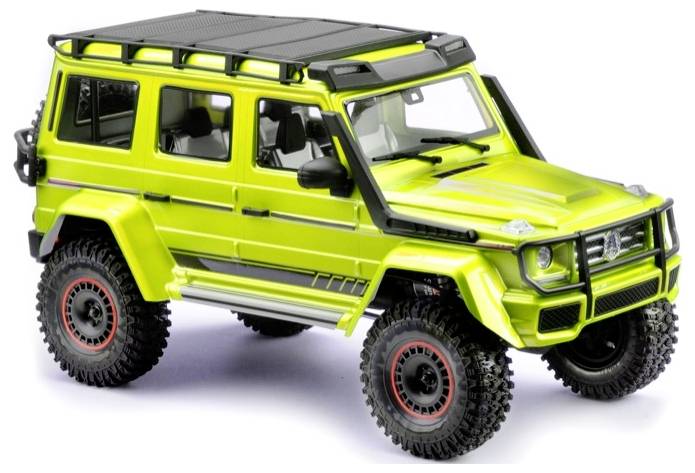 A lime-green toy off-road vehicle with chunky tyres stands on a white background.