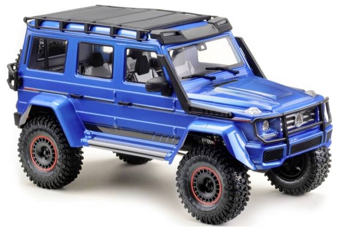 Blue off-road model car with a black roof, large tyres, and red accents.