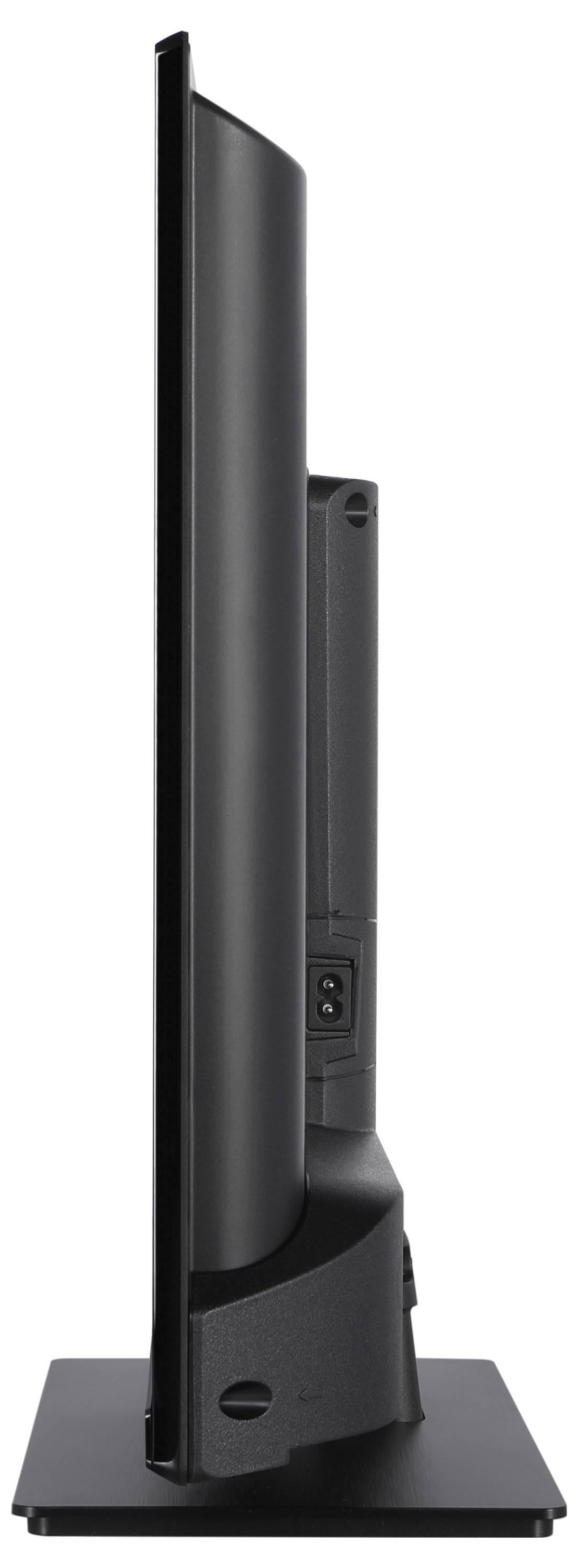 Side view of a flat television with a slim frame, standing on a rectangular base.